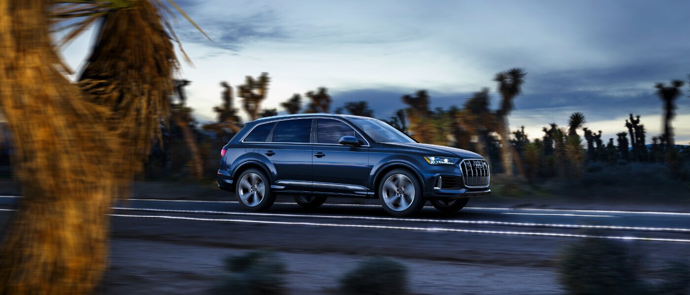 2021 Blue Audi Q5 Driving at Sunset