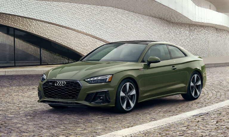 2022 Audi Q5 Coupe exterior parked in front of a building