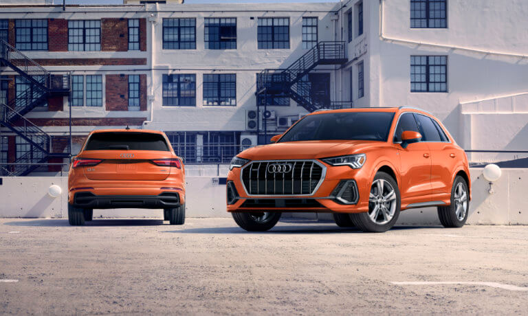 2021 Audi Q3 in orange exterior side and front view