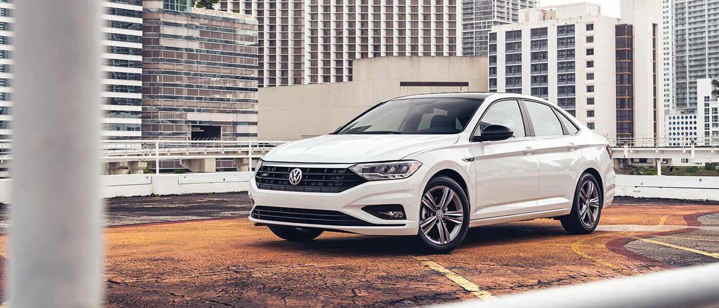 2020 VW Jetta A white 2020 VW Jetta parked on a rooftop garage