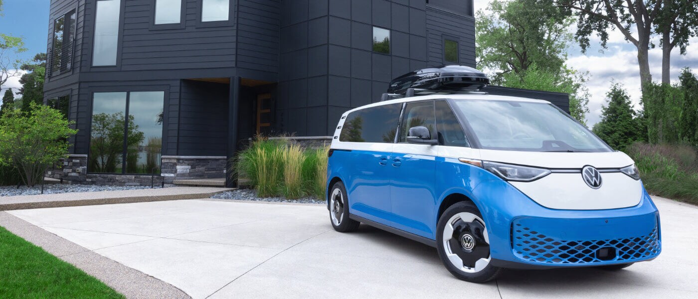 2025 VW ID. Buzz Exterior Parked In Front Of Modern Home