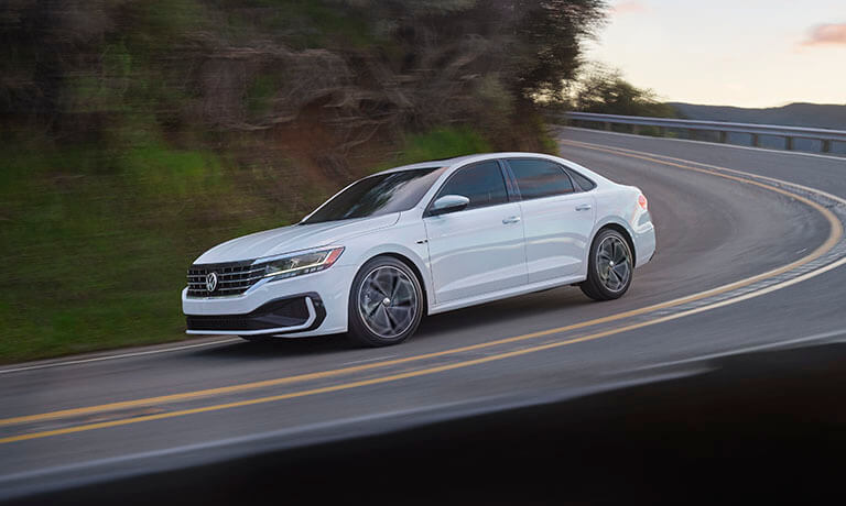 2022 VW Passat Exterior Driving Down Hill