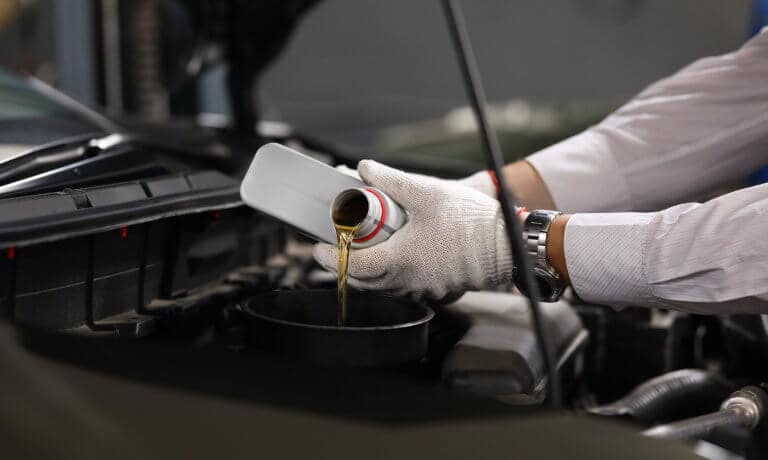 Service technician performing a brake replacement