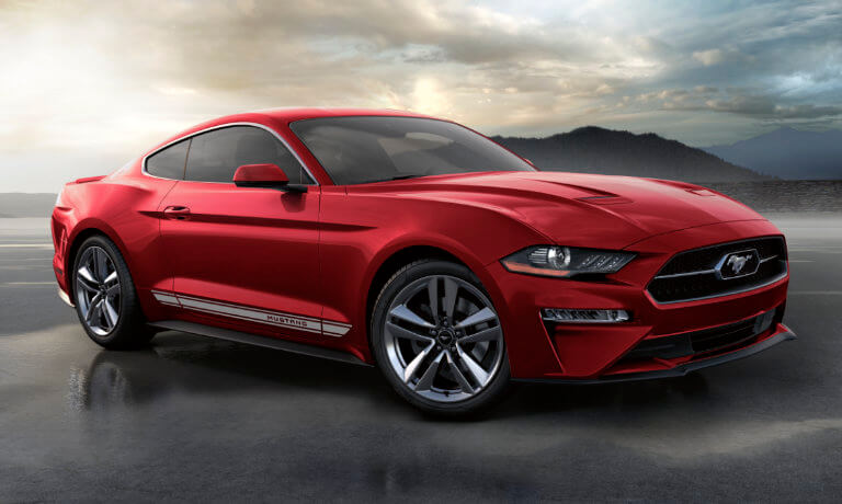 2020 Ford Mustang exterior with cloudy skys and mountains in distance