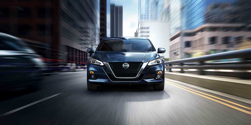 2019 Altima A blue 2019 Altima driving on the street