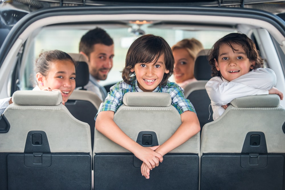 Mazda Auto Body Repair Shop Kids in the back of a Mazda vehicle.