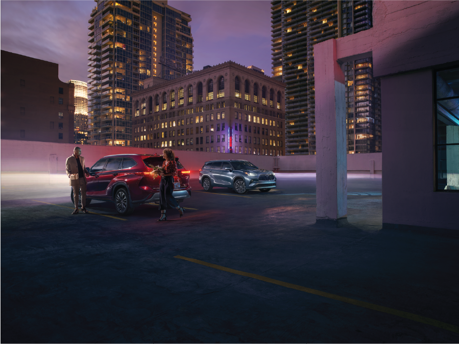 2022 Highlander Hybrid - Vibrant City Shot.png