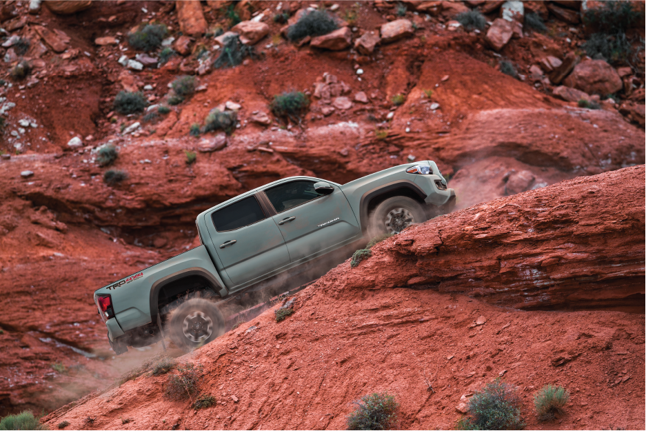 2022 Tacoma - Lunar Rock - Action Shot - Red Rocks.png
