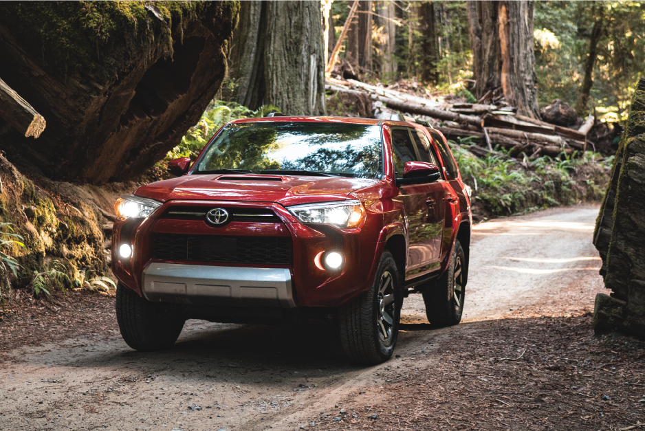 2022 4Runner - Red - Driving Through Woods.png