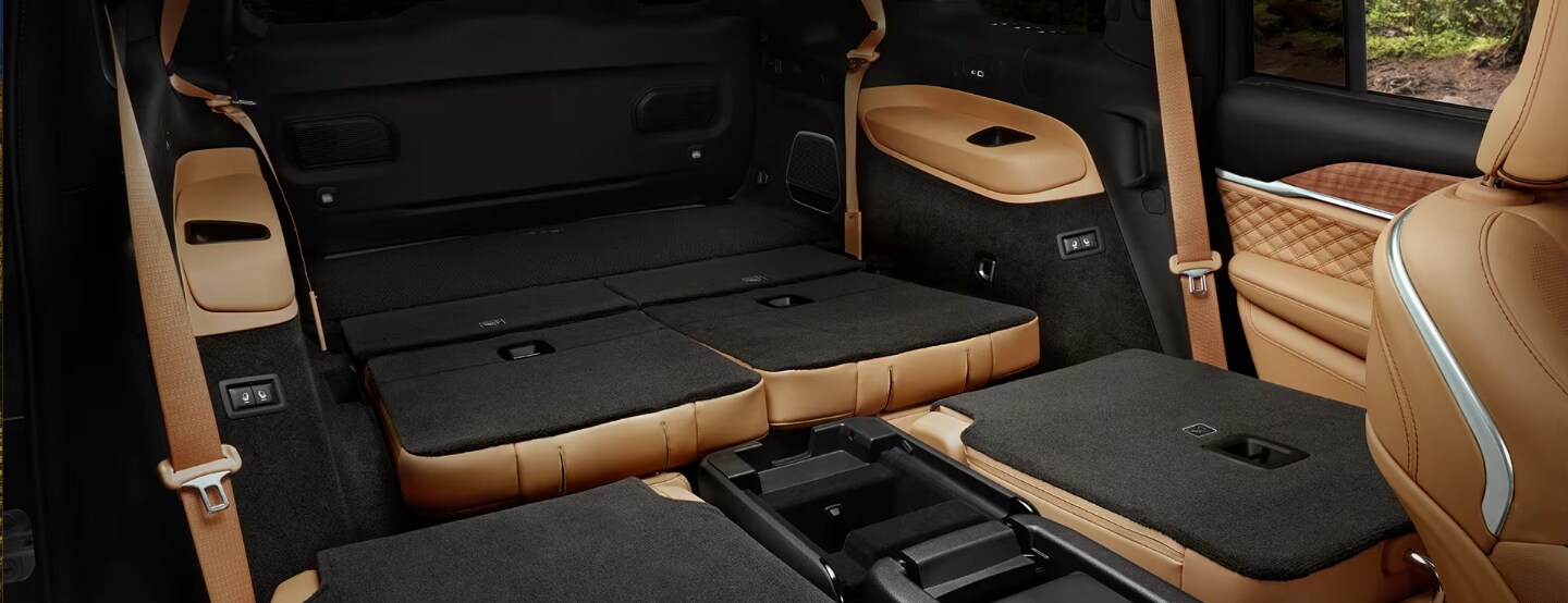 2024 Jeep Grand Cherokee interior with the second and third rows of seating folded down 2024 Jeep Grand Cherokee interior with the second and third rows of seating folded down