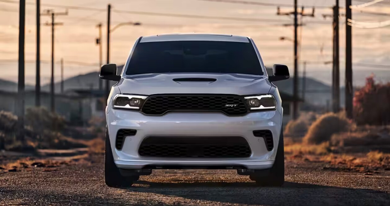 Front view of the 2024 Dodge Durango on a dirt road Front view of the 2024 Dodge Durango on a dirt road