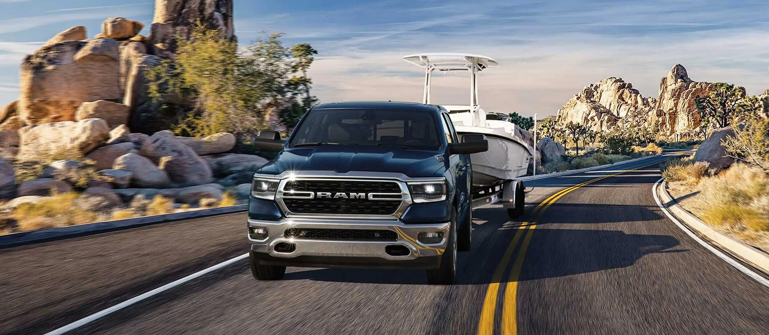 2023 RAM 1500 towing boat 2023 RAM 1500 towing boat
