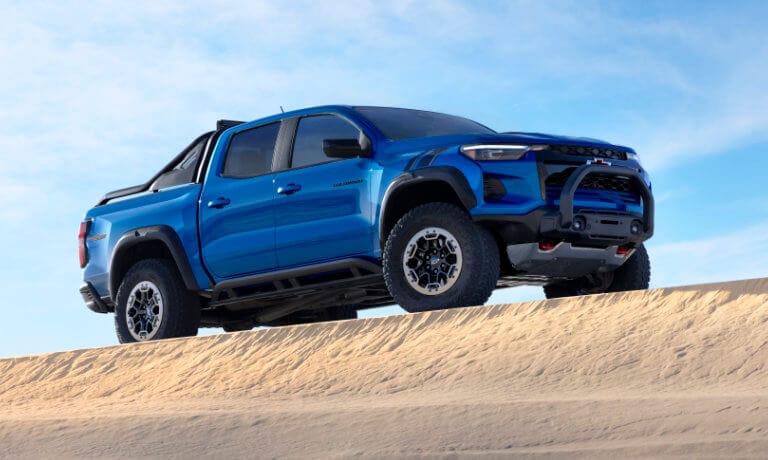 2024 Chevy Colorado parked on a sand dune
