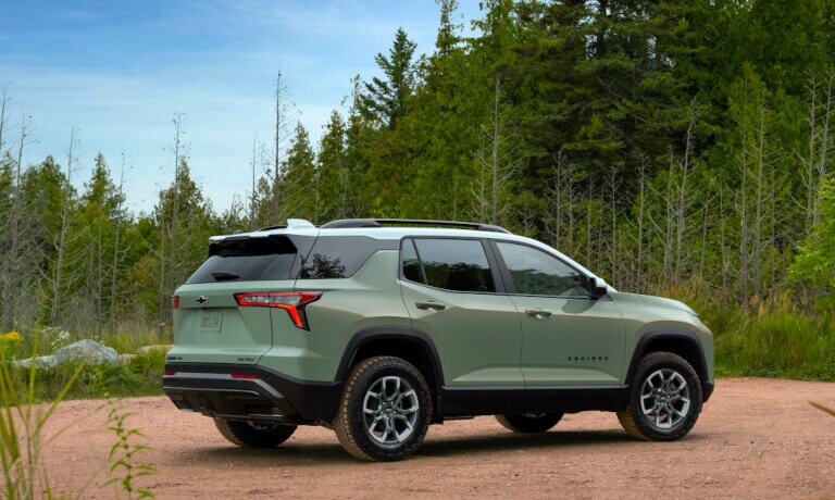 2026 Chevy Equinox parked in forest clearing