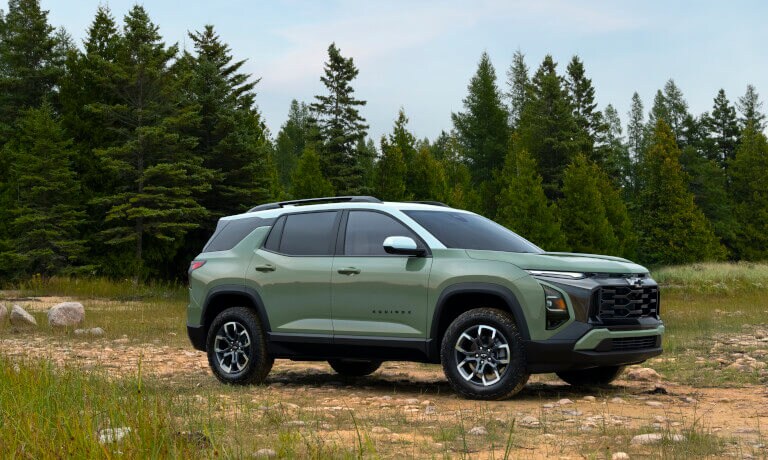 2025 Chevy Equinox parked on rocky shoreline