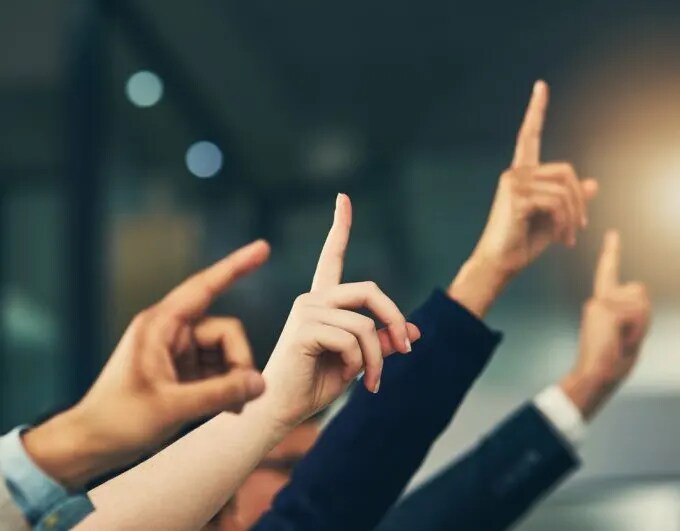 Frequently Asked Questions at Tommycar Collision Center people raising their hands