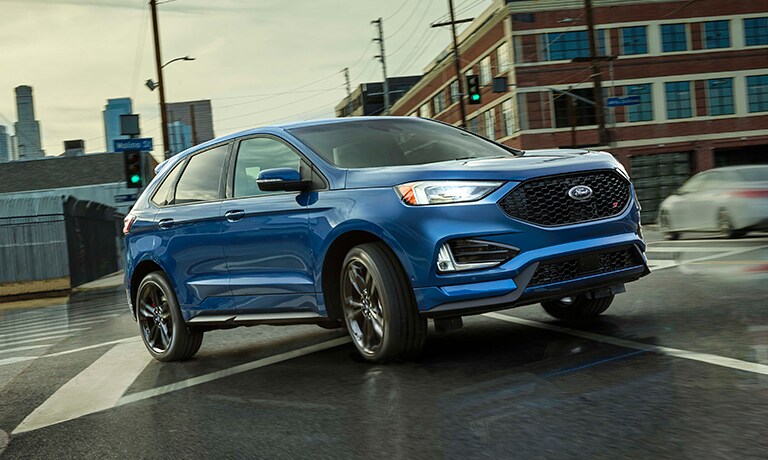 2019 Ford Edge ST turning on a city street