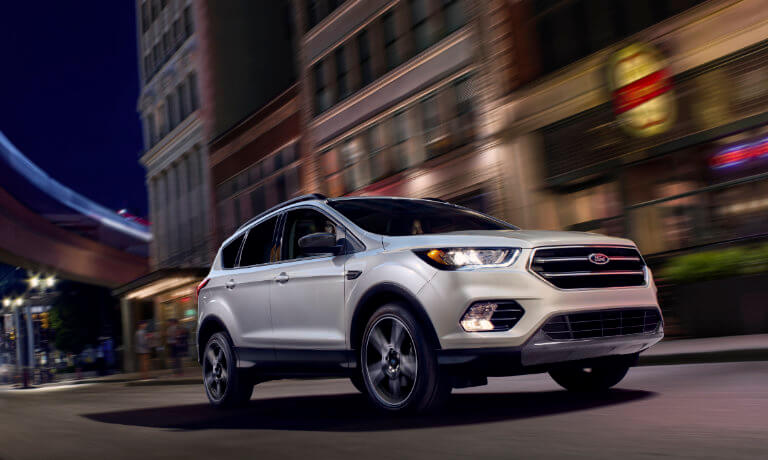 2019 Ford Escape driving in a city at night