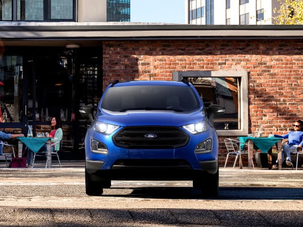 2019 Ford EcoSport A blue 2019 Ford EcoSport parked in front of a brick building