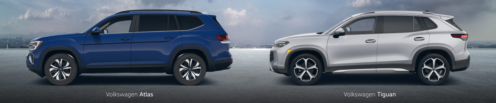 Side-by-side comparison of a blue Volkswagen Atlas and a white Volkswagen Tiguan shown in profile.