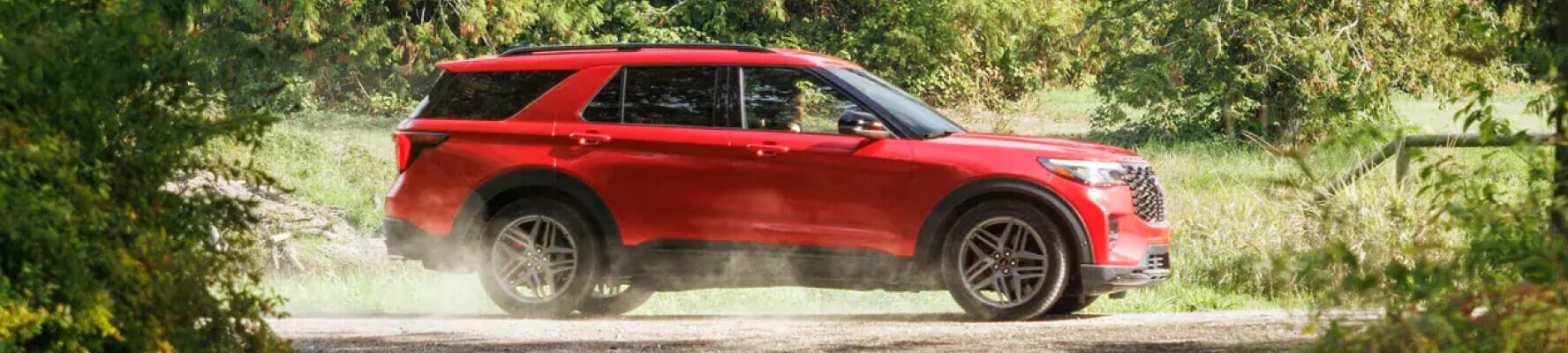 Side view of Ford Vehicle on a quiet back road