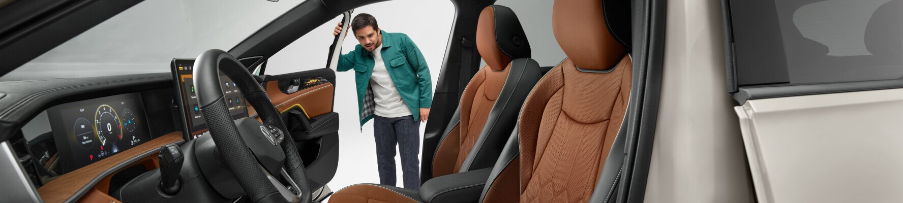 Customer inspecting Volkswagen vehicle interior