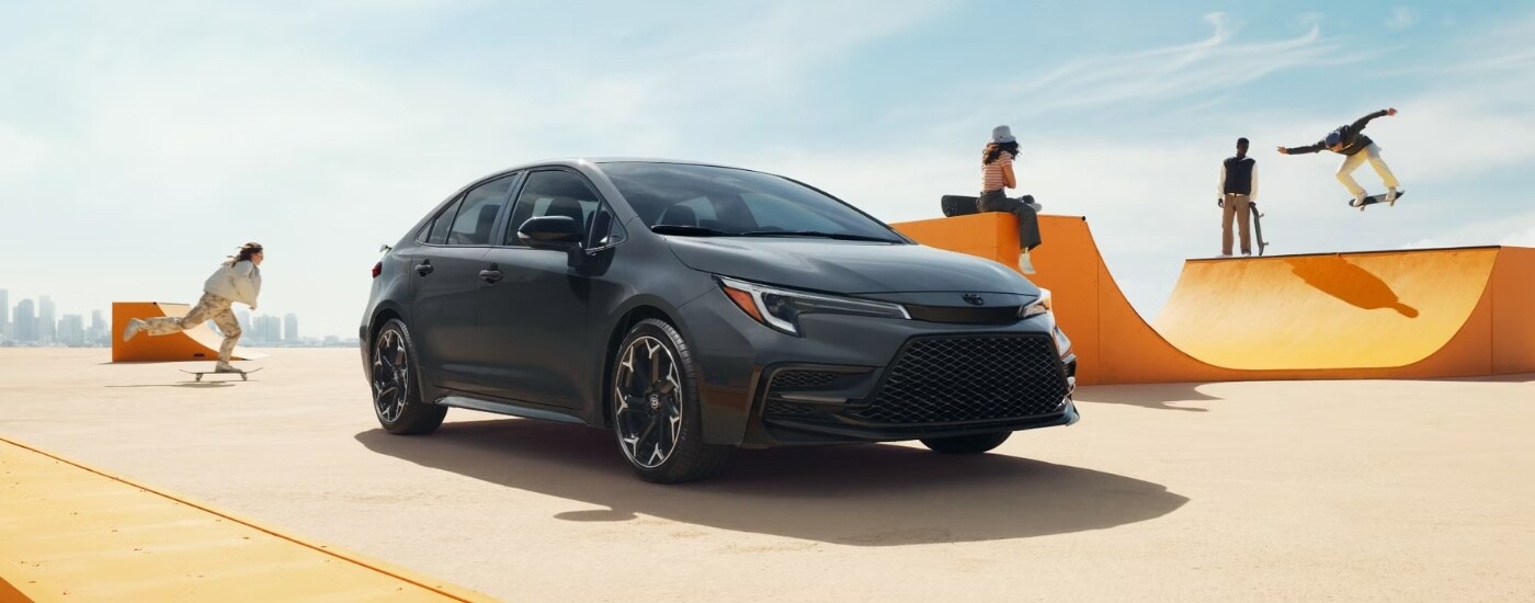 A grey 2024 Toyota Corolla from the front at an angle.