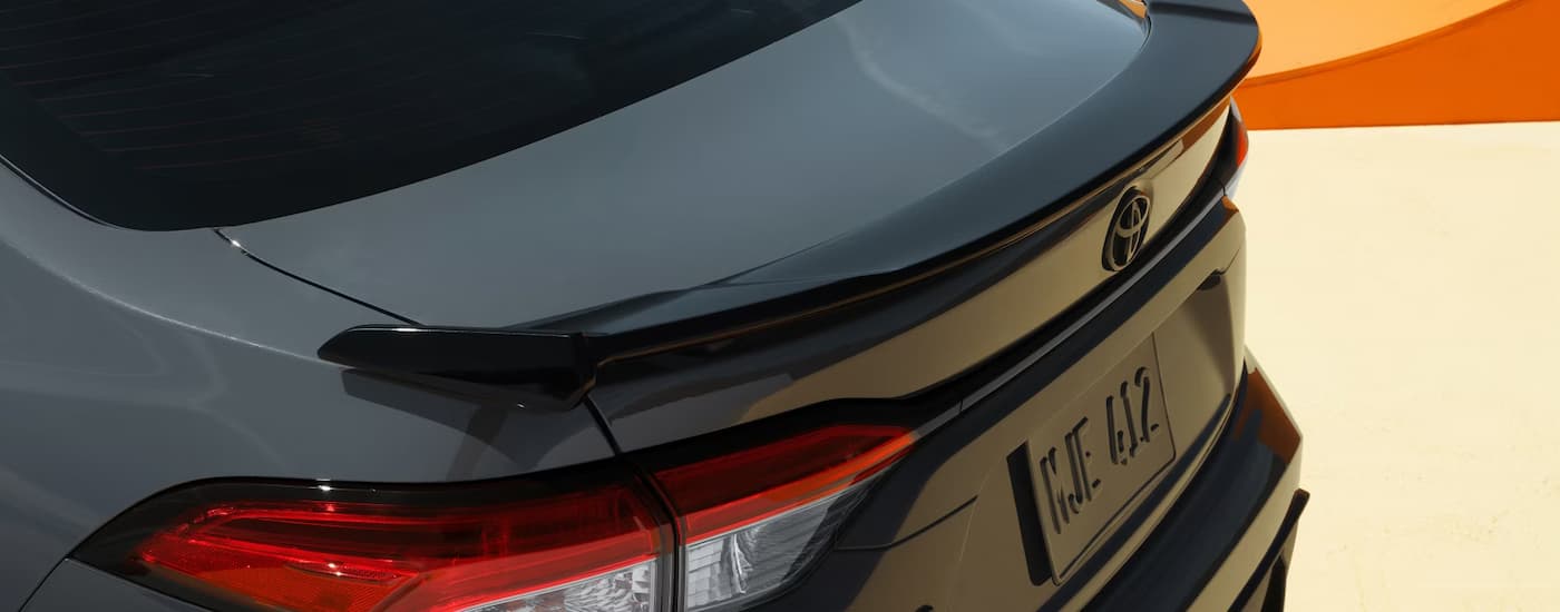 Toyota%20Corolla%20for%20Sale%202025%20Toyota%20Corolla%20FX%20-%20Above.jpg Trunk and spoiler on a dark grey 2025 Toyota Corolla