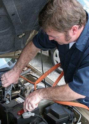 Honda Mechanic Charging Battery
