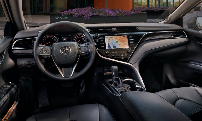 2020 Toyota Camry interior seating showing the front dash