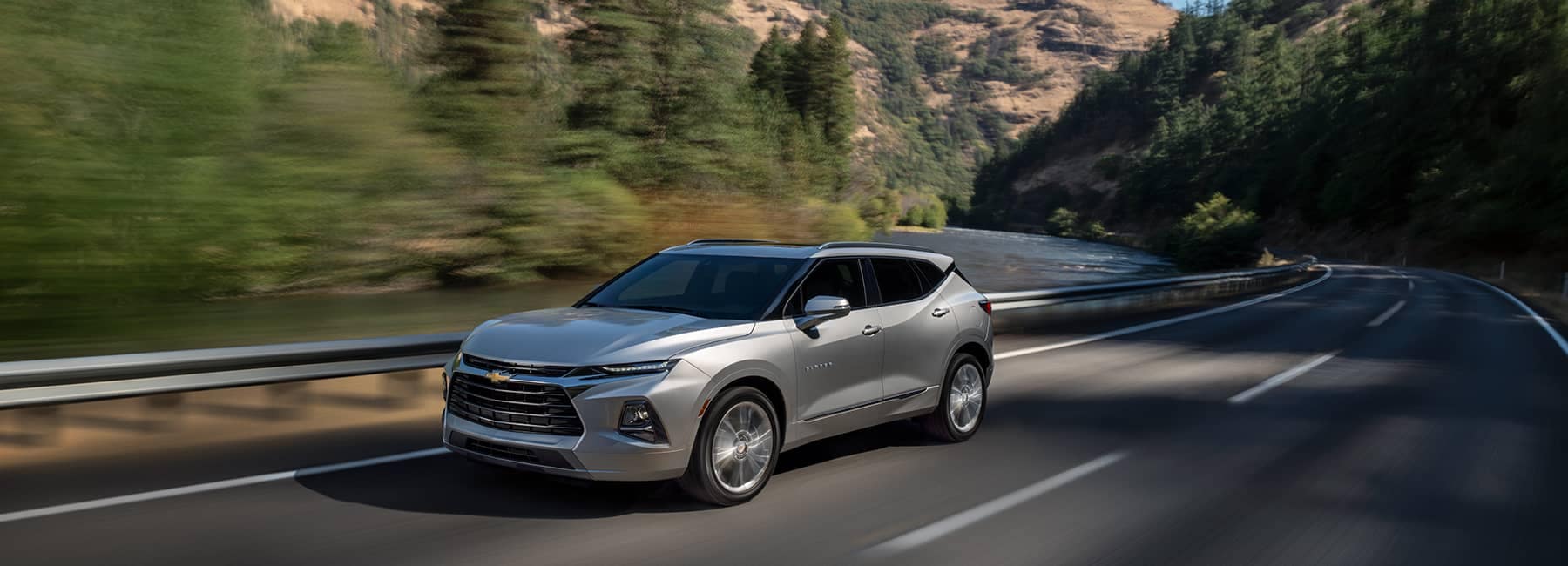 Silver-2020-Blazer-Driving-on-a-Mountain-Rd.jpg
