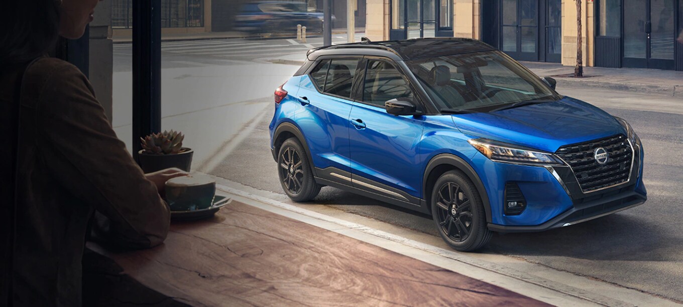 Nissan Kicks In Blue Being Viewed From Coffee Nissan Kicks In Blue Being Viewed From Coffee