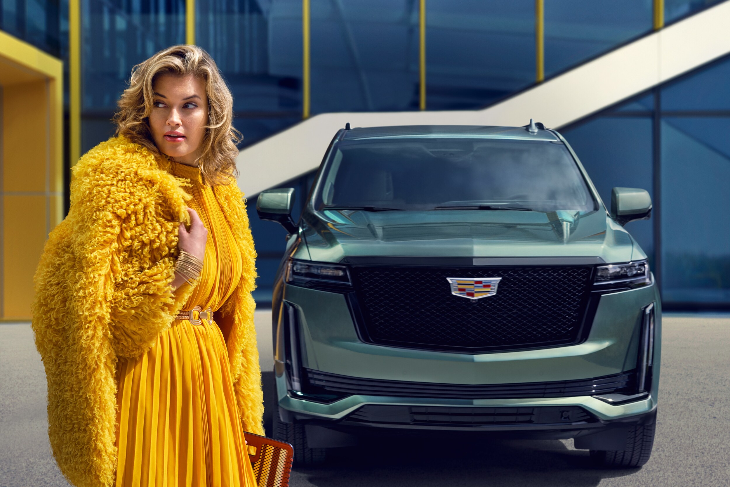 Woman in front of a car