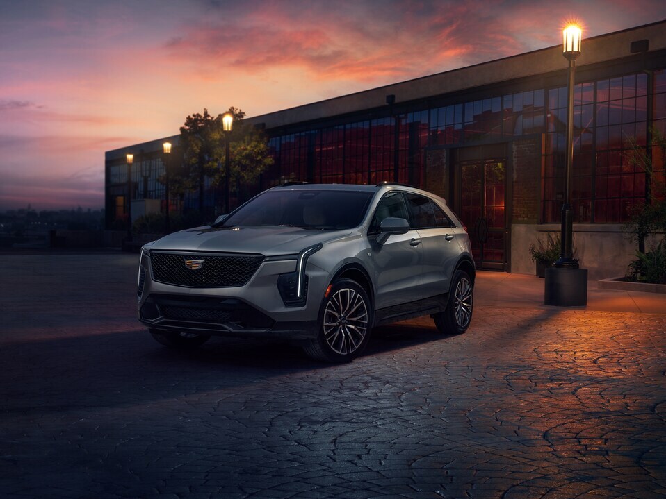 Woman in front of a car