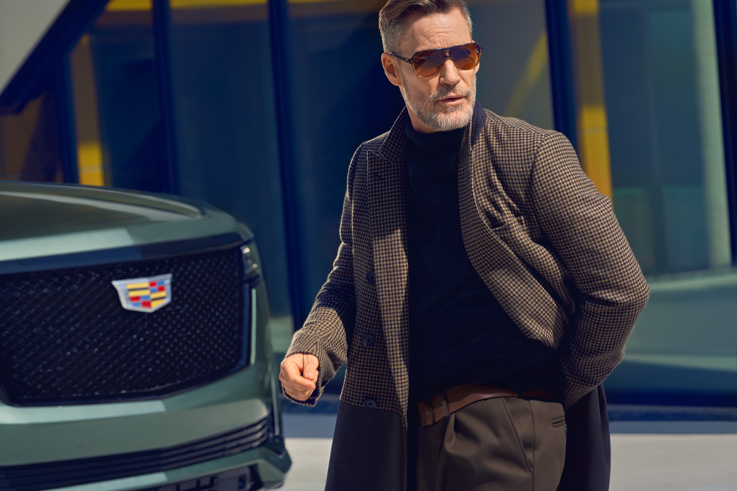 Man in front of a car