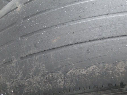 bald car tire.jpg what a bald car tire looks like