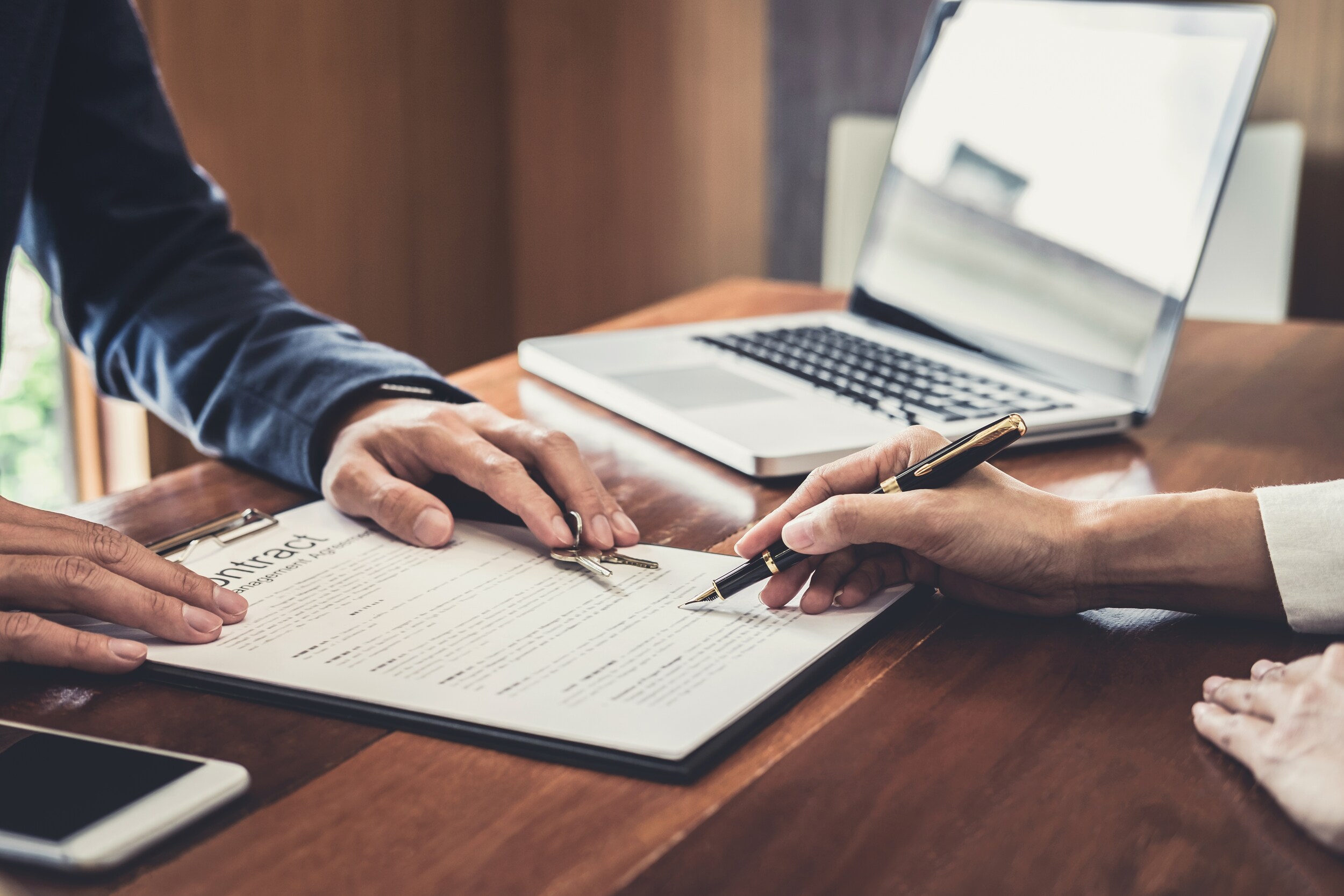sales-manager-filing-keys-to-customer-after-signing-rental-lease-contract-of-sale-purchase-agreement_t20_98rngB.jpg