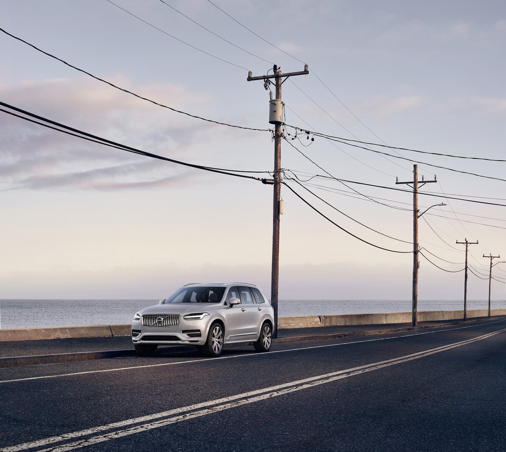 Comparison of the 2020 Volvo XC90 & the 2020 Audi Q7 at Volvo Cars New Bern of New Bern | 2020 XC90 parked on the street