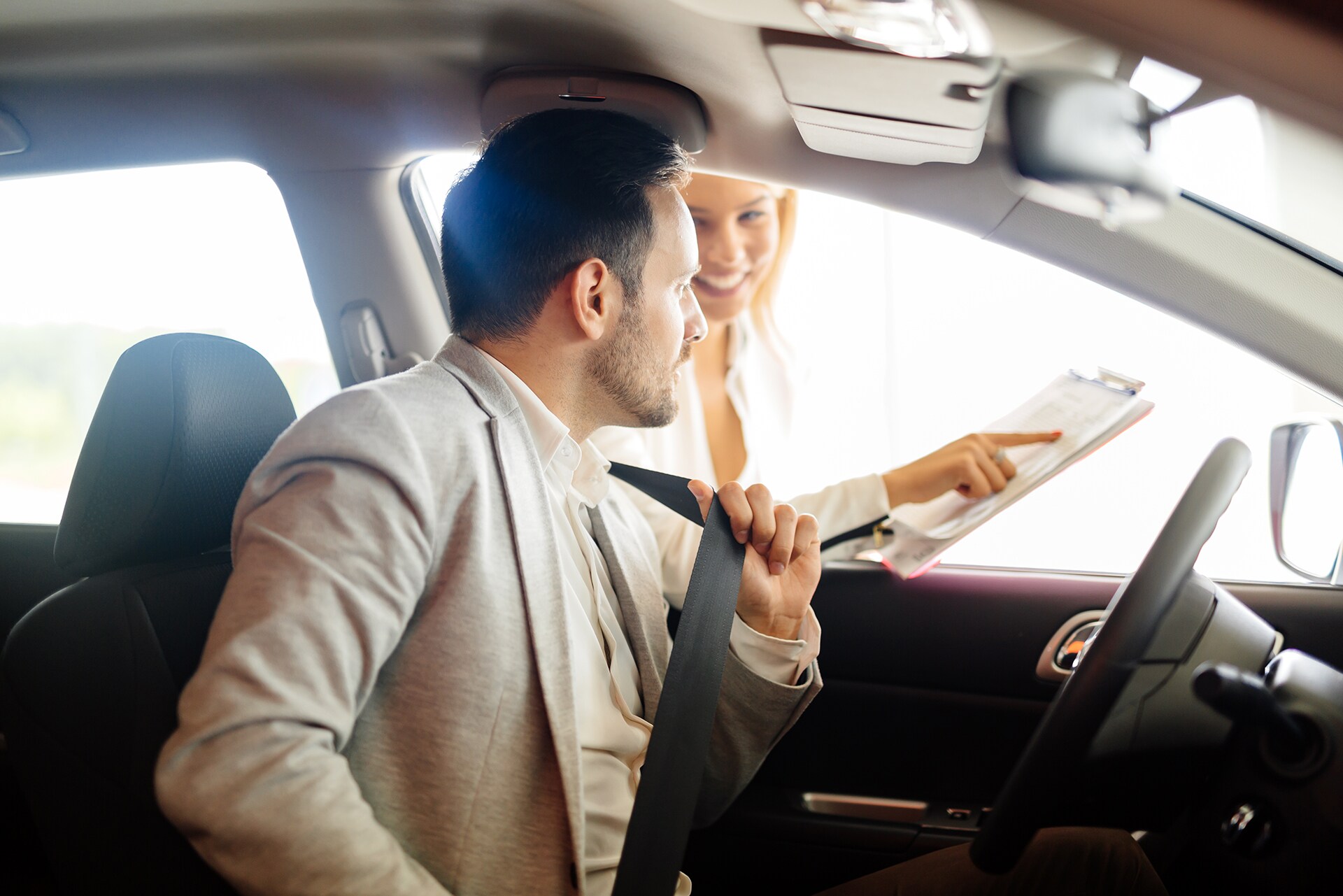 Volvo Cars New Bern is a Car Dealership near Bayboro, NC | Volvo sales associate helping customer