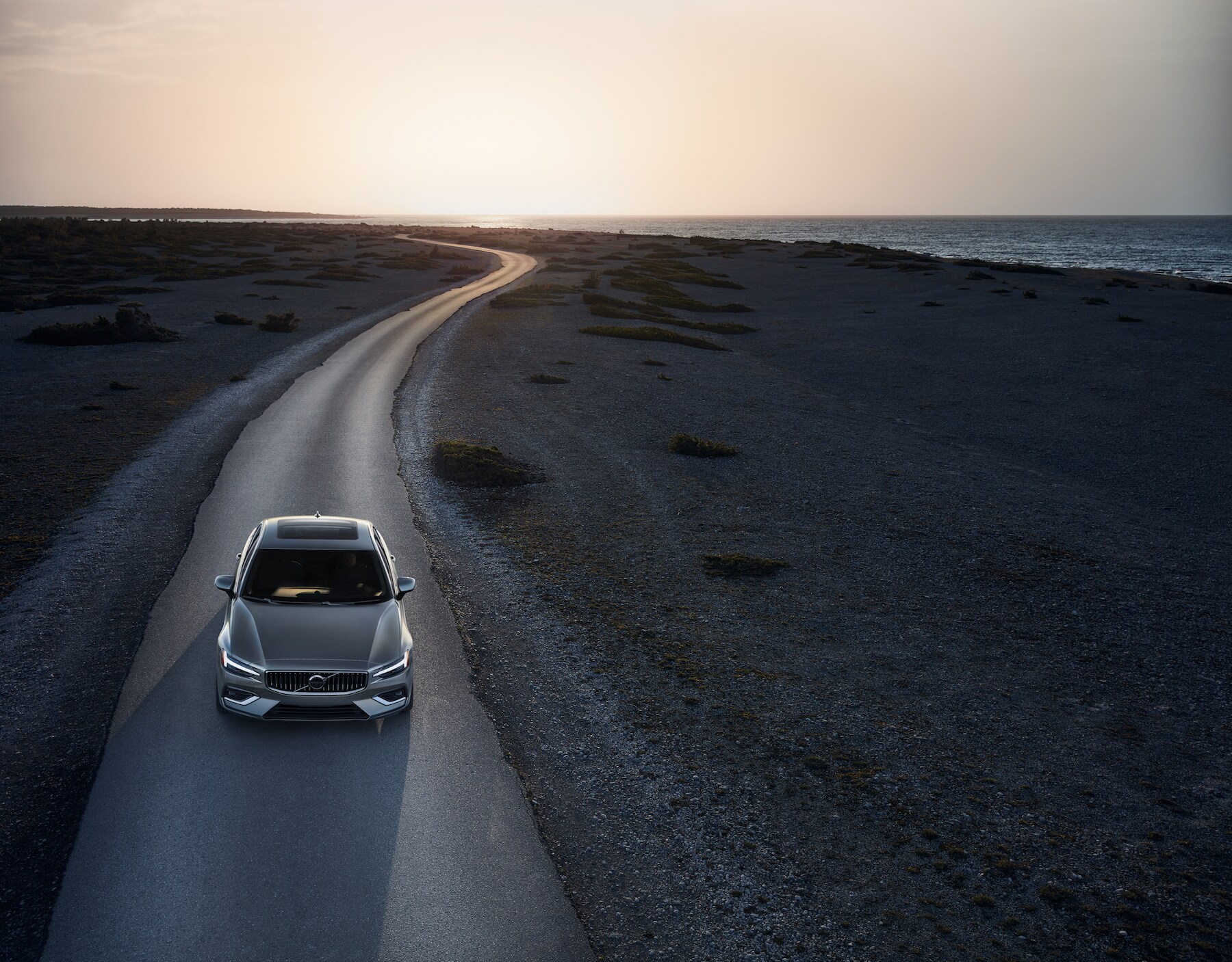 Comparison of the 2020 Volvo S60 vs. 2020 Audi A4 at Volvo Cars New Bern in New Bern | 2020 volvo driving on road