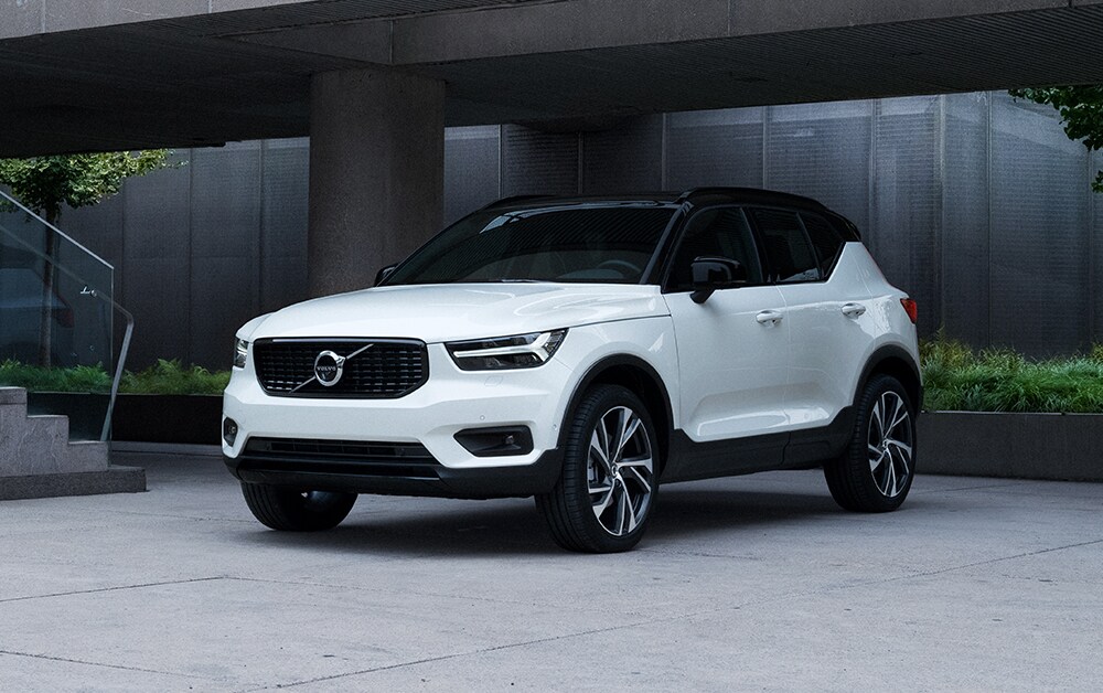 Volvo of New Bern is a Car Dealership in New Bern near Trent Woods, NC | White 2020 Volvo XC40 Parked Next to Modern Building Volvo of New Bern is a Car Dealership in New Bern near Trent Woods, NC | White 2020 Volvo XC40 Parked Next to Modern Building