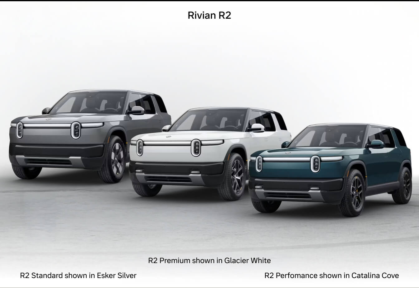 Three-quarter studio lineup displaying the 2026 Rivian R2 Standard in Esker Silver, R2 Premium in Glacier White, and R2 Performance in Catalina Cove.