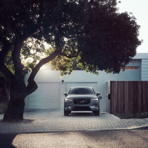 Volvo electric car plugged in charging