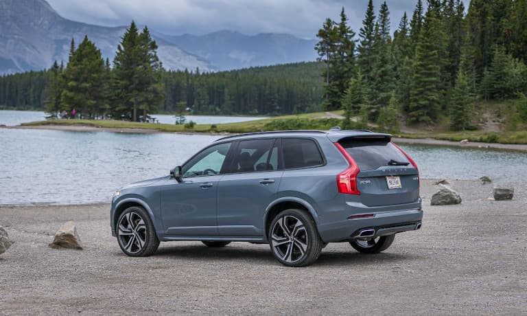Volvo XC90 parked outside by water