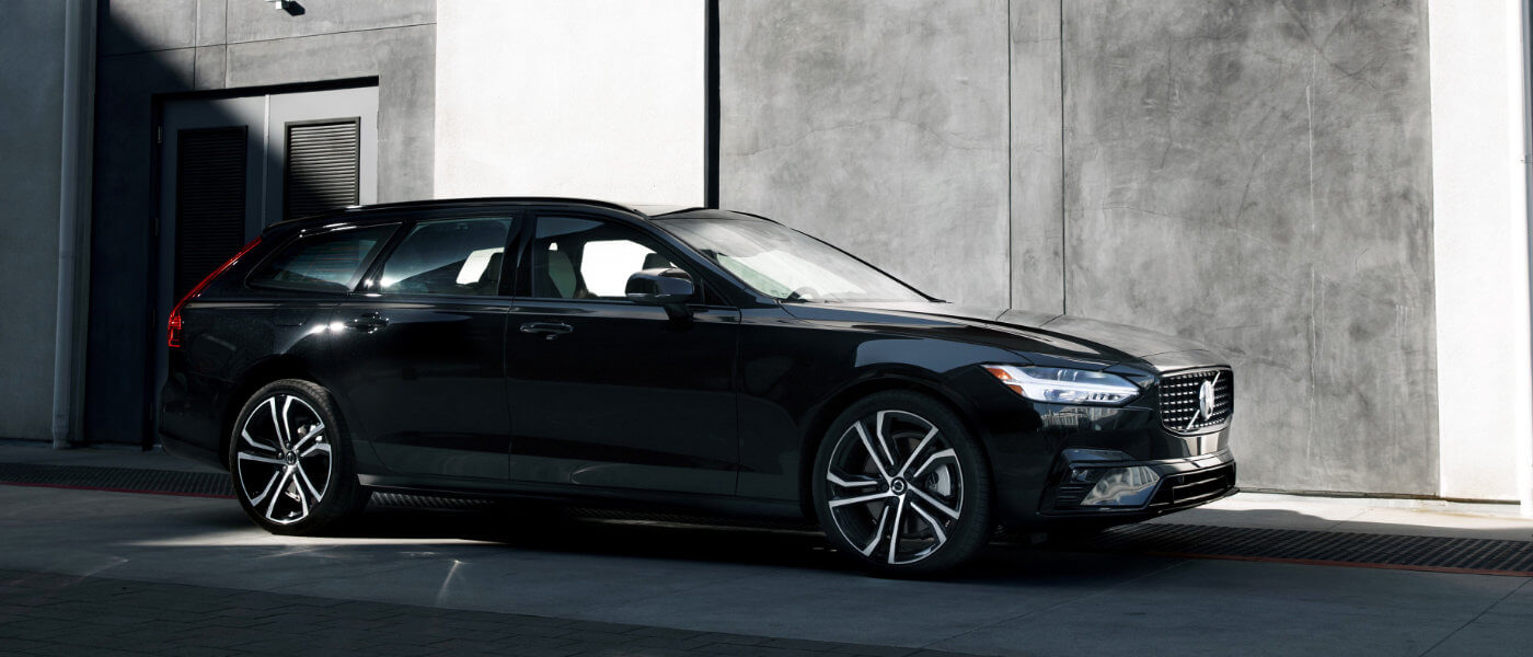 2021 Volvo V90 parked outside a house