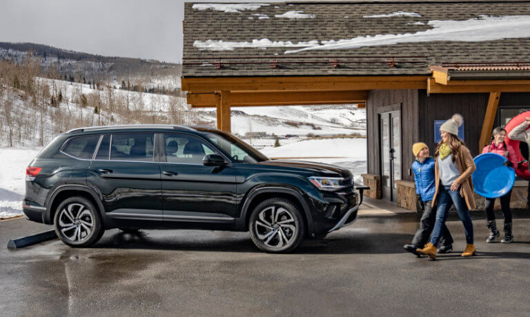 2023 Volkswagen Atlas exterior family at wintertime