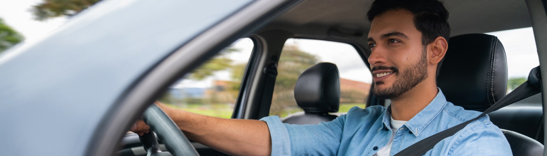 First Time Buyer driving off in their new vehicle