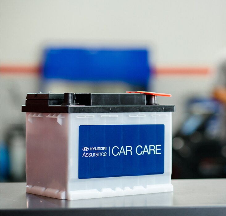 Everything You Need to Know about Your Car Battery at West Broad Hyundai | Close up of Hyundai car battery with the words 'Car Care' on it
