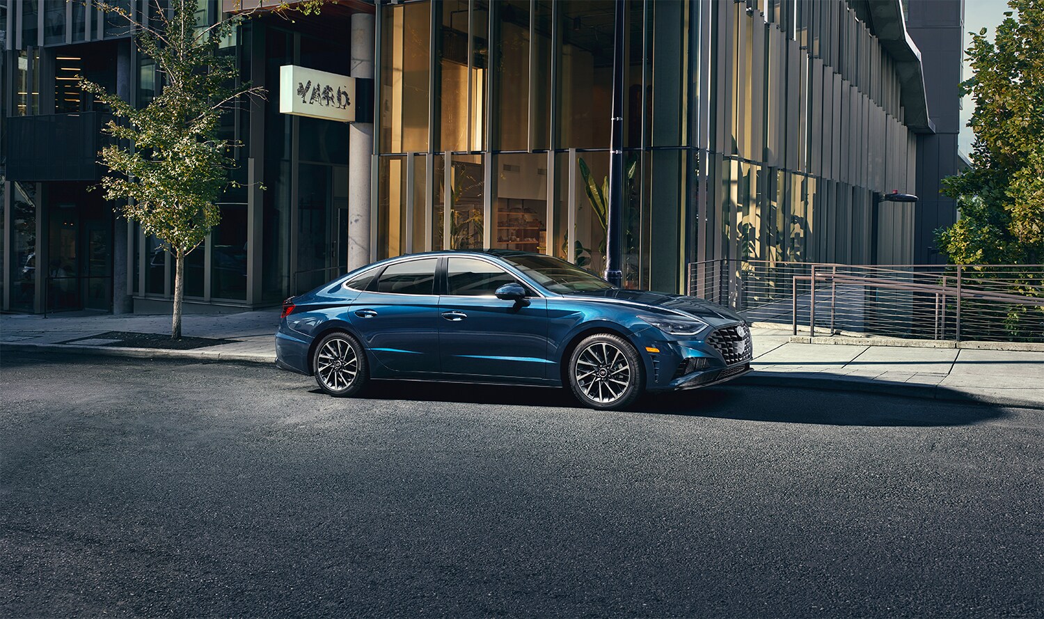 West Broad Hyundai is a Hyundai Dealership near Ashland, VA | 2020 Hyundai Sonata parked out front of building