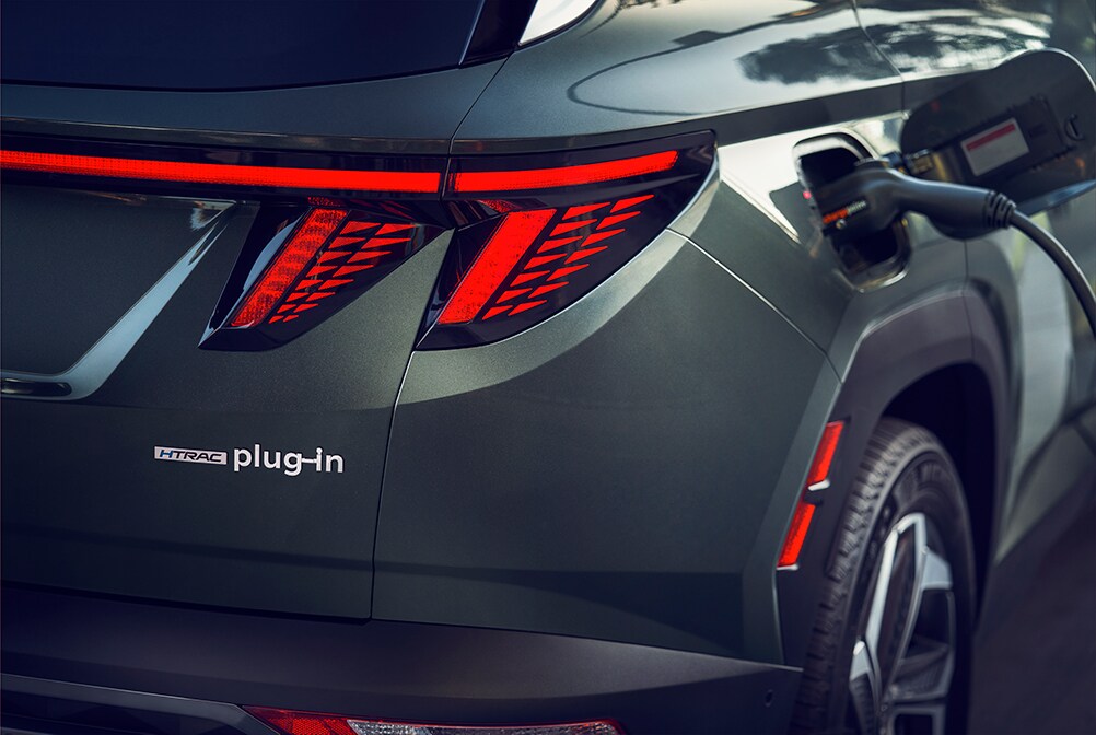 All-New 2022 Tucson Plug-in Hybrid at West Broad Hyundai | 2022 Hyundai Tucson PHEV taillights and rear trim badge